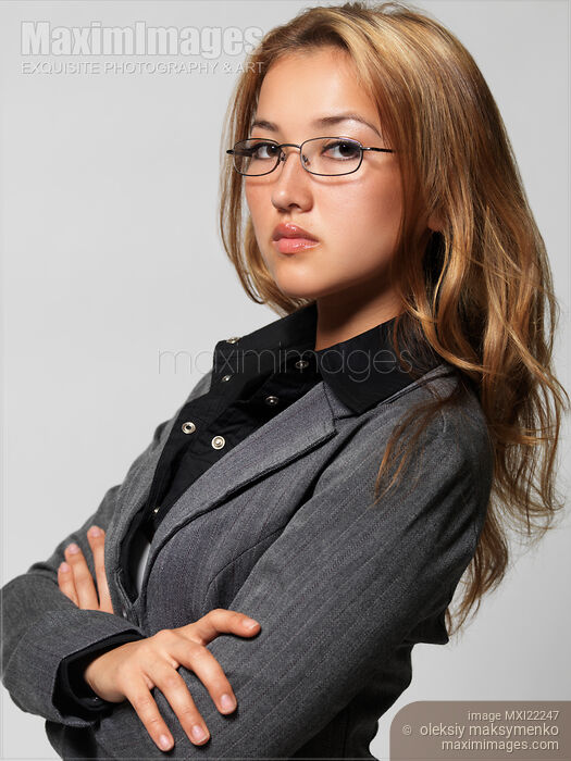 Stock photo of Portrait of a Young Attractive Businesswoman Buy commercial use license at MaximImages