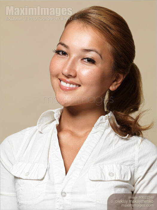 Portrait of a Young Attractive Woman Stock photo of Portrait of a Young Attractive Woman Buy commercial use license at MaximImages