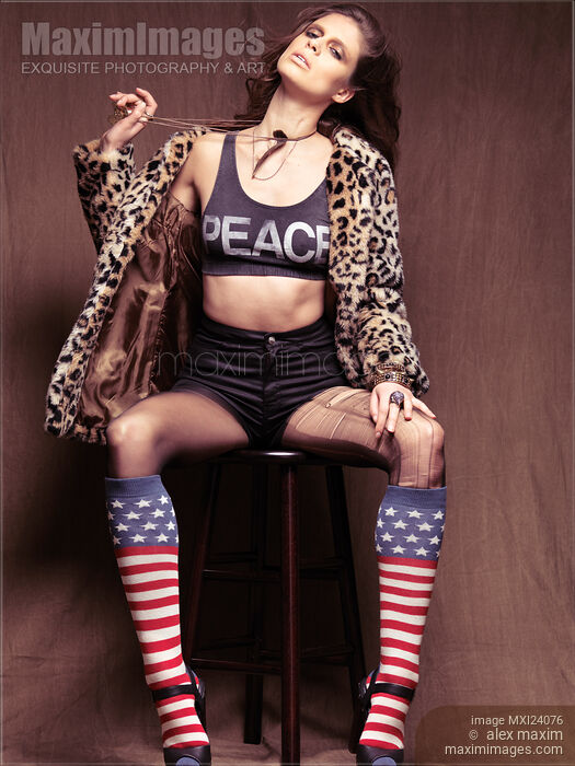Stock photo of Portrait of a young woman dressed in 90s grunge fashion style Buy commercial use license at MaximImages