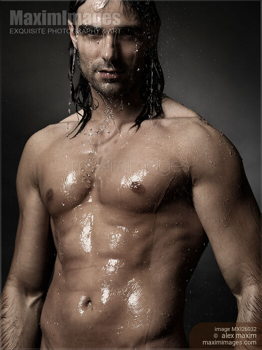 Portrait of man with wet bare torso standing under shower Stock photo of Portrait of man with wet bare torso standing under shower Buy commercial use license at MaximImages