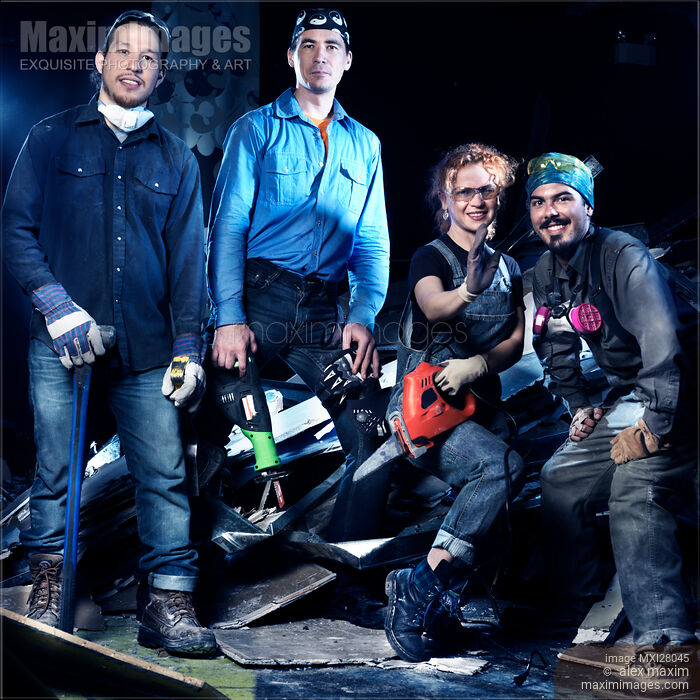Stock photo of Portrait of people with tools doing renovations Buy commercial use license at MaximImages