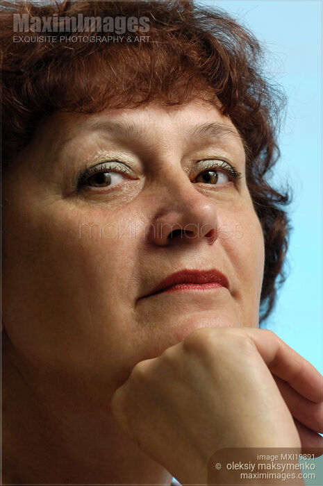 Stock photo of Portrait of woman in her sixties Buy commercial use license at MaximImages