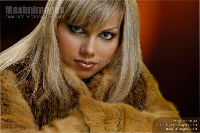 Portrait of Woman with Blond Hair in Fur Coat Stock photo of Portrait of Woman with Blond Hair in Fur Coat Buy commercial use license at MaximImages