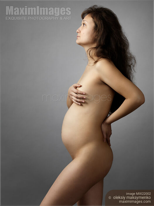 Stock photo of Pregnant Woman Buy commercial use license at MaximImages