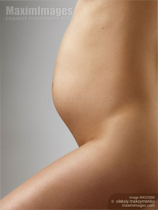 Stock photo of Pregnant Woman Belly Buy commercial use license at MaximImages