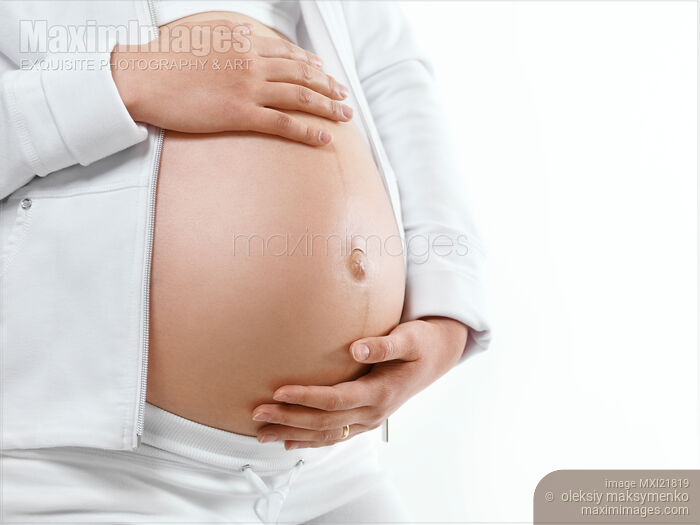 Pregnant Woman Body Stock photo of Pregnant Woman Body Buy commercial use license at MaximImages