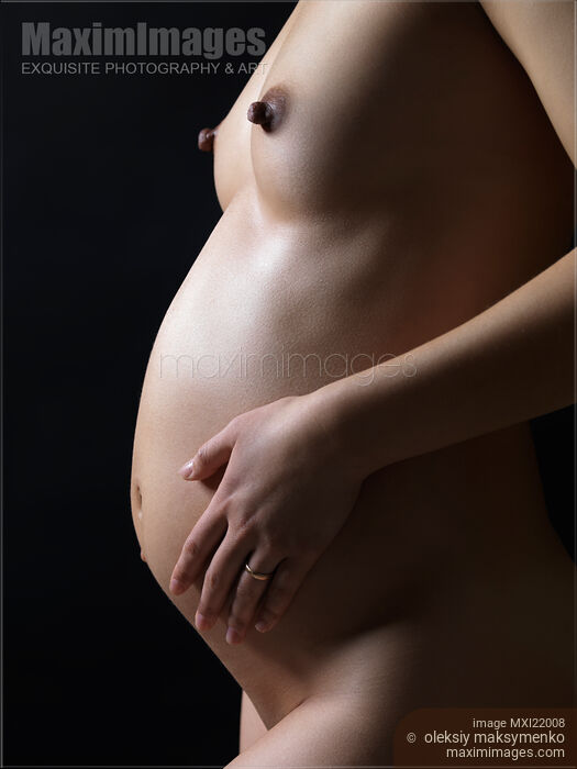 Stock photo of Pregnant Woman Body Buy commercial use license at MaximImages