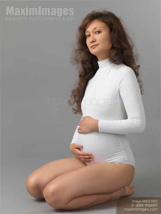 Pregnant Young Woman Stock photo of Pregnant Young Woman Buy commercial use license at MaximImages
