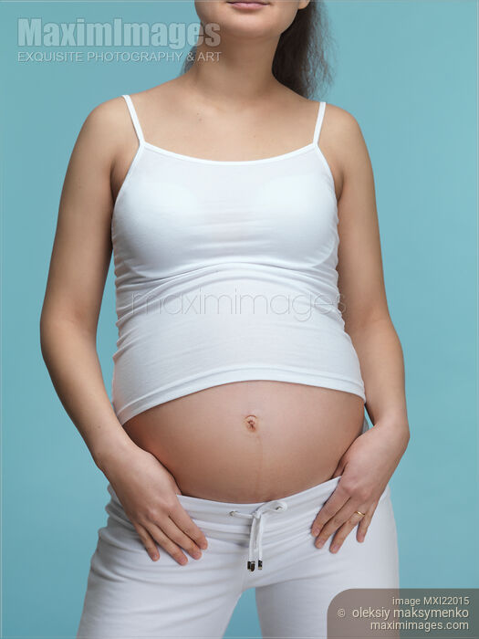 Stock photo of Pregnant Young Woman Buy commercial use license at MaximImages