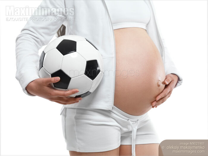 Stock photo of Pregnant Young Woman with a Soccer Ball Buy commercial use license at MaximImages