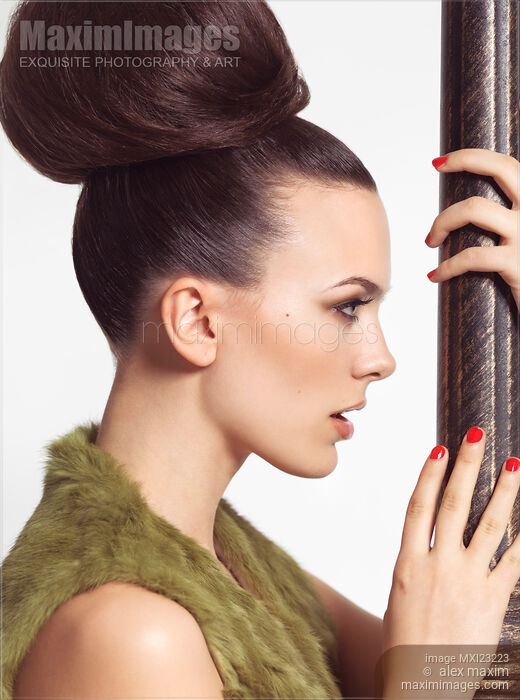 Stock photo of Profile Portrait of a Beautiful Young Woman Buy commercial use license at MaximImages