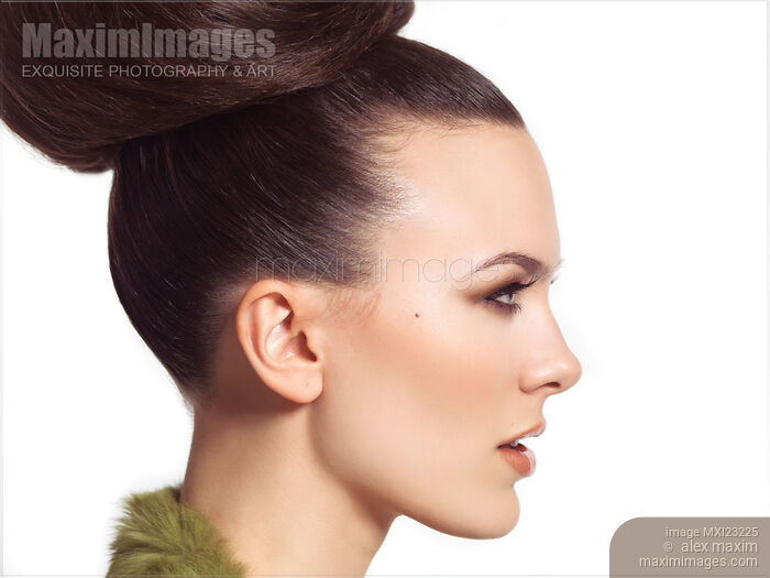 Profile Portrait of a Beautiful Young Woman Stock photo of Profile Portrait of a Beautiful Young Woman Buy commercial use license at MaximImages