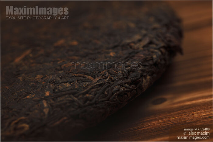 Pu-er Pu-erh closeup of fermented aged Chinese black tea Stock photo of Pu-er Pu-erh closeup of fermented aged Chinese black tea Buy commercial use license at MaximImages