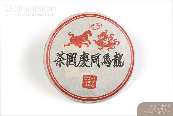 Stock photo of Pu'er or Pu-erh aged fermented Chinese tea wrapped in packaging Buy commercial use license at MaximImages