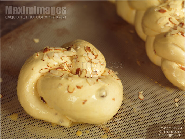 Stock photo of Raw Braided Bread Glazed with Egg Buy commercial use license at MaximImages