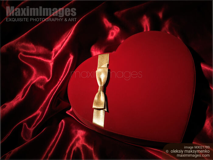 Stock photo of Red Heart-Shaped Gift Box Buy commercial use license at MaximImages