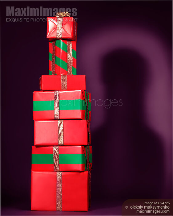Stock photo of Red presents stacked in shape of bottle Buy commercial use license at MaximImages