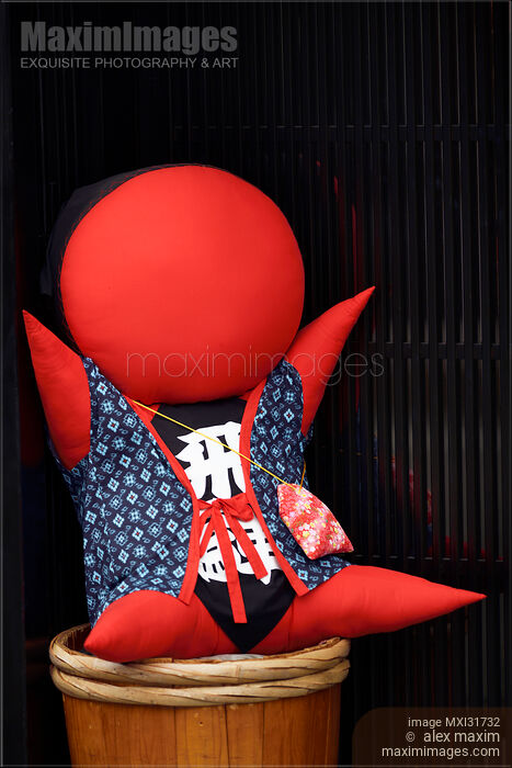Stock photo of Red Sarubobo doll Japanese amulet charm and souvenir local to Takayama Buy commercial use license at MaximImages