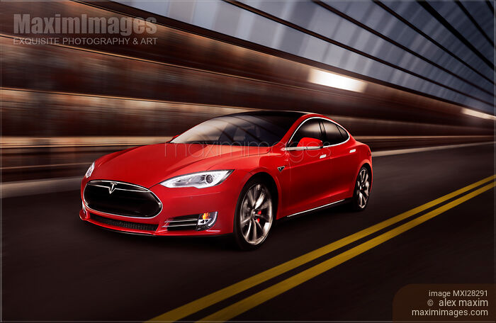 Red Tesla Model S red luxury electric car speeding in a tunnel Stock photo of Red Tesla Model S red luxury electric car speeding in a tunnel Buy commercial use license at MaximImages