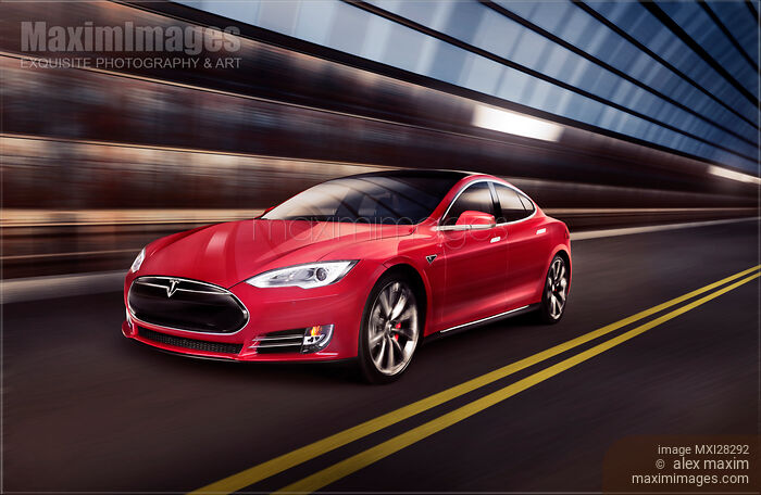 Red Tesla Model S red luxury electric car speeding in a tunnel Stock photo of Red Tesla Model S red luxury electric car speeding in a tunnel Buy commercial use license at MaximImages