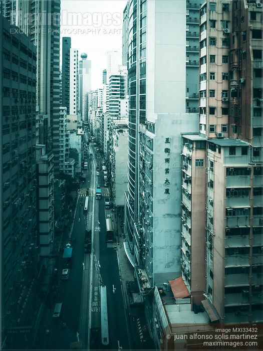 Residential high-rise buildings along a street in Hong Kong China Stock photo of Residential high-rise buildings along a street in Hong Kong China Buy commercial use license at MaximImages