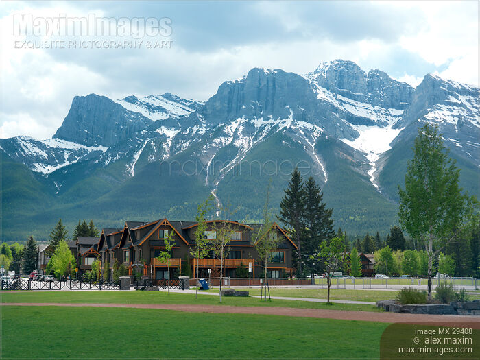 Residential houses in Canmore Alberta with Rocky Mountains nature scenery Stock photo of Residential houses in Canmore Alberta with Rocky Mountains nature scenery Buy commercial use license at MaximImages