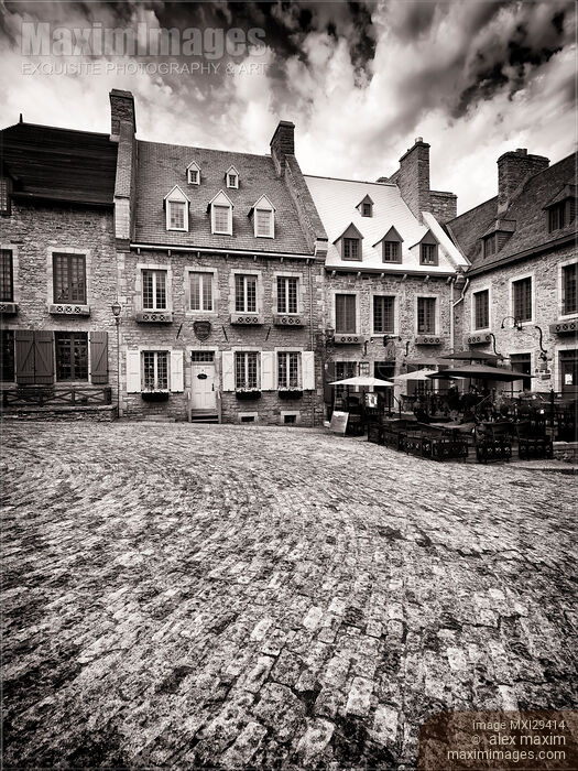 Stock photo of Restaurant La Pizz terrace and Galerie Place Royale in Royal Square of Old Quebec City Black and white Buy commercial use license at MaximImages