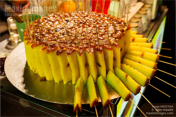 Stock photo of Rice cake at food market in China Buy commercial use license at MaximImages
