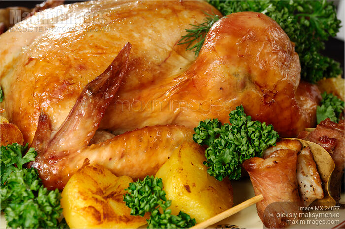 Stock photo of Roast chicken closeup Buy commercial use license at MaximImages