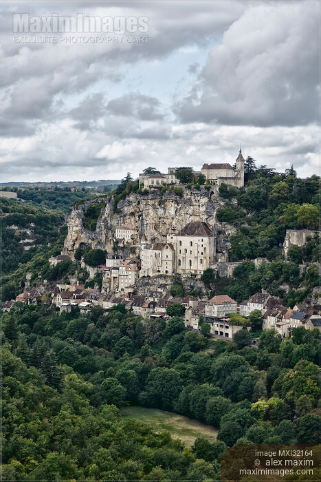 Stock photo of Rocamador Medieval cliffside village built into rock Rocamador France Buy commercial use license at MaximImages