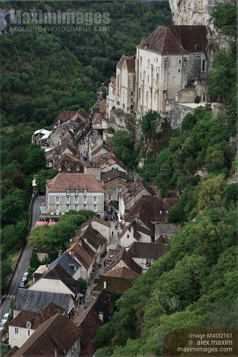 Stock photo of Rocamadour Medieval village with houses built into the side of a cliff in France Buy commercial use license at MaximImages