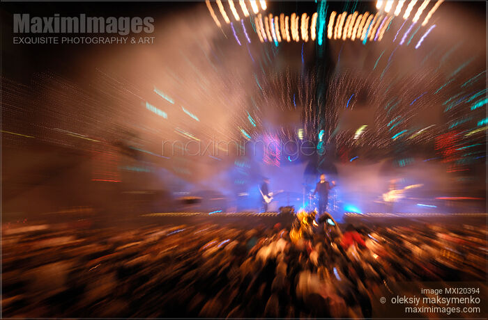 Rock Band Performing on a Stage Stock photo of Rock Band Performing on a Stage Buy commercial use license at MaximImages