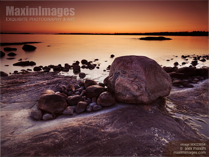 Stock photo of Rocky Shore at Twilight Buy commercial use license at MaximImages