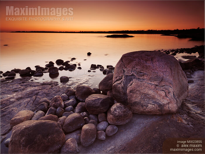 Stock photo of Rocky Shore at Twilight Buy commercial use license at MaximImages