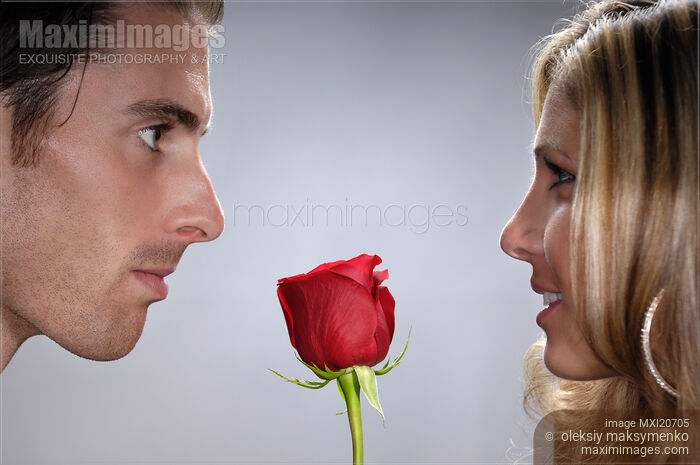 Romantic young couple faces Stock photo of Romantic young couple faces Buy commercial use license at MaximImages