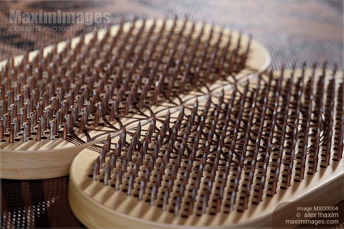 Sadhu Board Yogic board of sharp metal nails Closeup Stock photo of Sadhu Board Yogic board of sharp metal nails Closeup Buy commercial use license at MaximImages