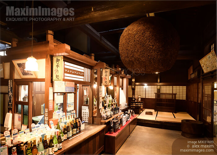 Stock photo of Sake brewery shop interior with Sugidama cedar ball hanging inside Takayama Japan Buy commercial use license at MaximImages