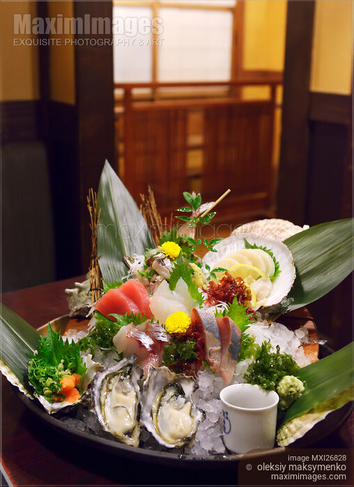 Stock photo of Sashimi and oysters at Japanese sushi restaurant Buy commercial use license at MaximImages