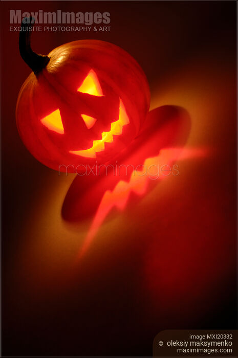 Stock photo of Scary Jack-o-lantern Illuminated From Inside Buy commercial use license at MaximImages