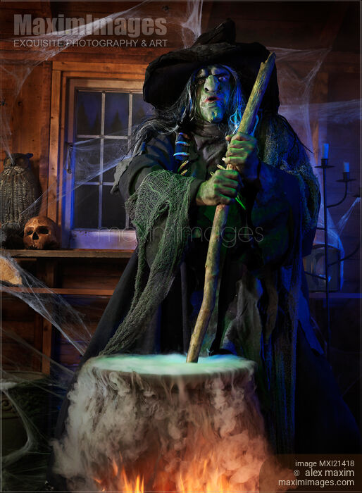 Scary Old Witch with a Cauldron Stock photo of Scary Old Witch with a Cauldron Buy commercial use license at MaximImages