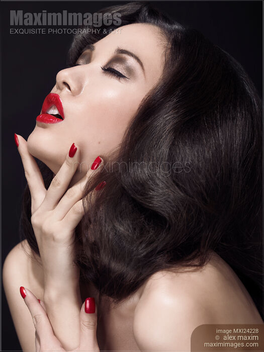 Sensual beauty portrait of a woman with red lipstick Stock photo of Sensual beauty portrait of a woman with red lipstick Buy commercial use license at MaximImages