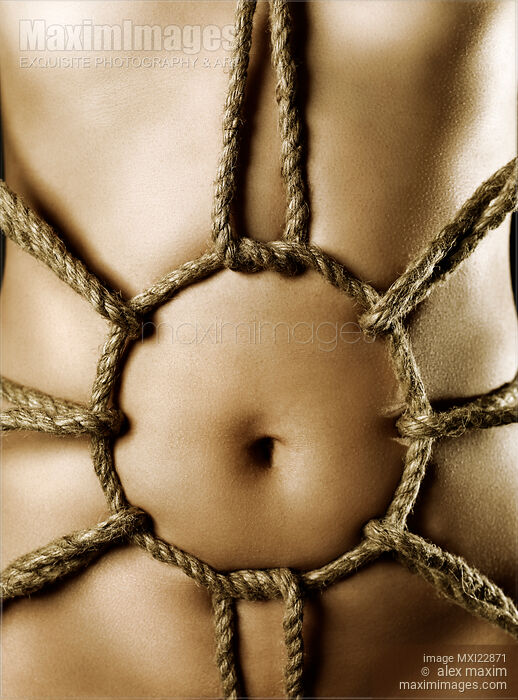 Sensual Bondage ropes on sexy nude woman body Stock photo of Sensual Bondage ropes on sexy nude woman body Buy commercial use license at MaximImages