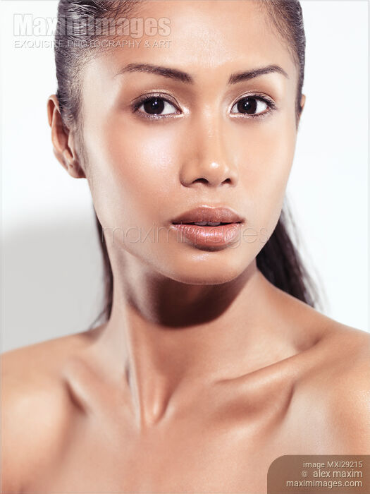 Sensual closeup beauty portrait of a young woman exotic face Stock photo of Sensual closeup beauty portrait of a young woman exotic face Buy commercial use license at MaximImages