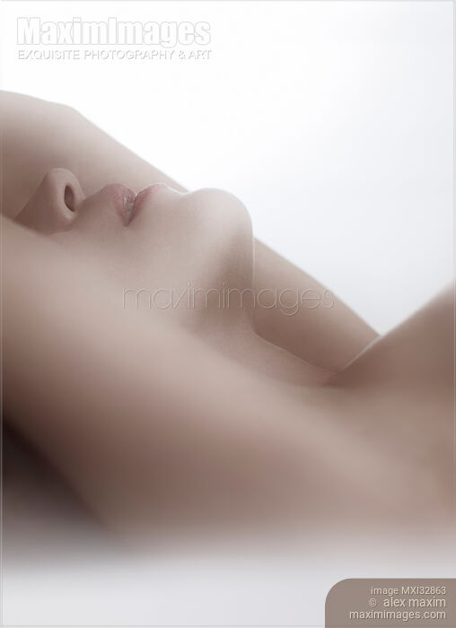 Sensual closeup of nude woman neck and lips in soft white light Making love Artistic concept Stock photo of Sensual closeup of nude woman neck and lips in soft white light Making love Artistic concept Buy commercial use license at MaximImages