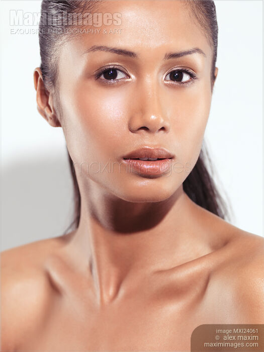 Sensual closeup portrait of a beautiful young woman Stock photo of Sensual closeup portrait of a beautiful young woman Buy commercial use license at MaximImages