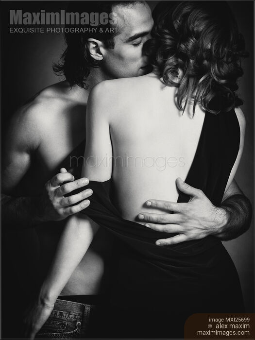 Stock photo of Sensual couple portrait of man kissing woman Black and white Buy commercial use license at MaximImages