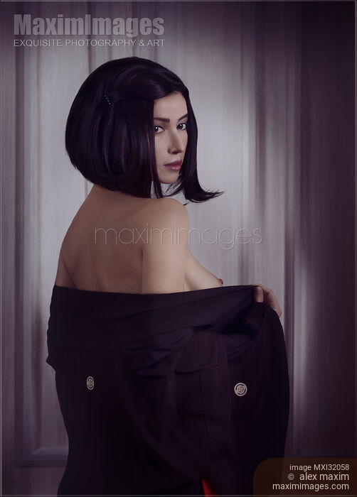 Sensual portrait of a beautiful asian woman with short black hair and expressive look taking off kimono Stock photo of Sensual portrait of a beautiful asian woman with short black hair and expressive look taking off kimono Buy commercial use license at MaximImages