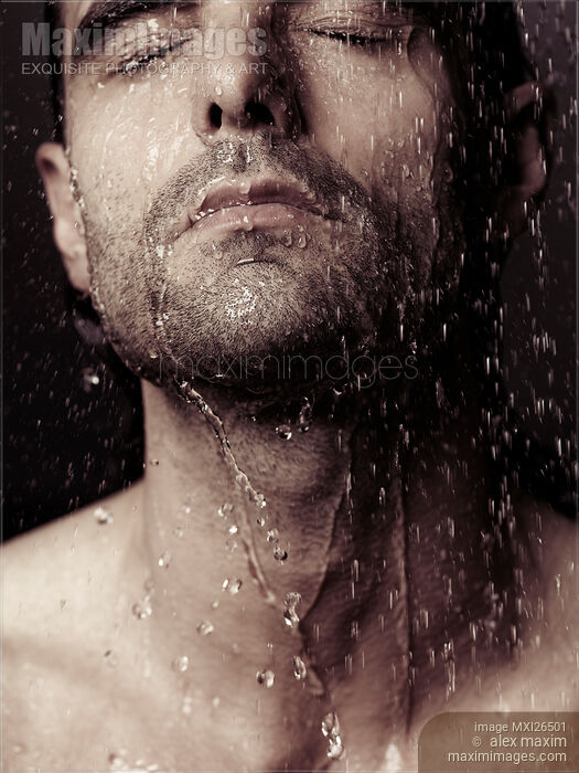 Sensual portrait of man face under shower Stock photo of Sensual portrait of man face under shower Buy commercial use license at MaximImages