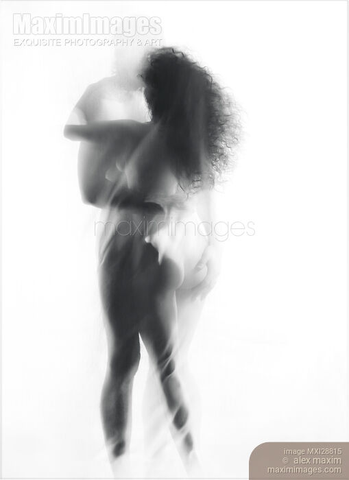 Sensual surreal portrait of a sexy nude kissing couple bodies behind sheer veil Stock photo of Sensual surreal portrait of a sexy nude kissing couple bodies behind sheer veil Buy commercial use license at MaximImages