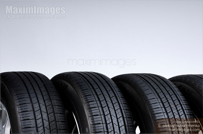 Stock photo of Set of Car Tires Buy commercial use license at MaximImages